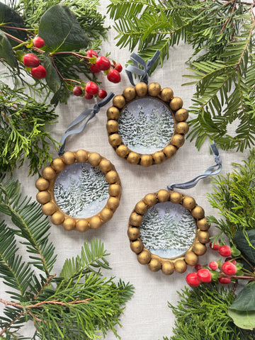 snowy pines framed ornaments